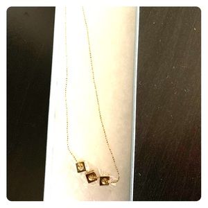 Triad gold pendant necklace